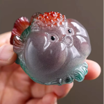 Tea pet vis van hars die van kleur verandert