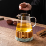 Theelichtverwarmer voor theepot van groen steengoed