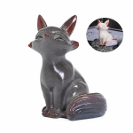 Theepet vos en babyfiguur — Zittend dier