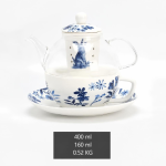 Theeservies met glazen theepot en blauw konijn