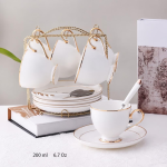 Theeservies met gouden rand van Bone China — 6 koppen met houder