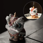Thermochromische tea pet met dansende leeuw van hars