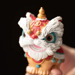 Thermochromische tea pet met dansende leeuw van hars