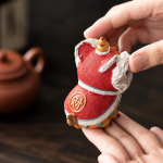Thermochromische tea pet met dansende leeuw van hars