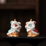 Thermochromische tea pet met dansende leeuw van hars
