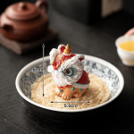 Thermochromische tea pet met dansende leeuw van hars