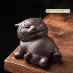 Tijger tea pet van paarse klei — Zittend