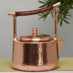 Vintage koperen theepot met hamerslag
