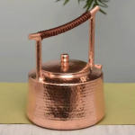 Vintage koperen theepot met hamerslag