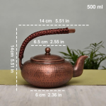Vintage koperen theepot met hamerslag en gevlochten hengsel — Donkerbruin koper