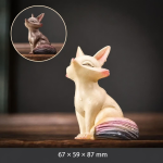 Vossen tea pet van hars met warmtegevoelige staart