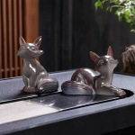 Vosvormige tea pet in 2 houdingen