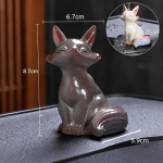 Vosvormige tea pet in 2 houdingen — Zittend donkergrijs