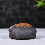 Yixing tea pet met gestileerd gezicht