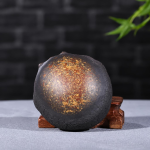 Yixing tea pet met gestileerd gezicht